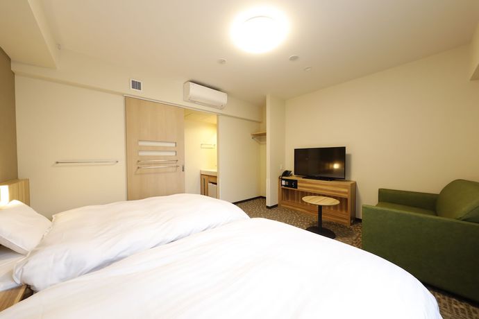 Imagen de la habitación del Hotel Dormy Inn Maebashi Natural Hot Spring. Foto 9