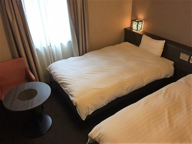 Imagen de la habitación del Hotel Dormy Inn Nagasaki Shinchi Chinatown Hot Spring. Foto 11