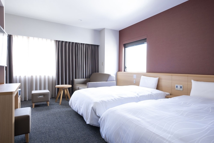 Imagen de la habitación del Hotel Dormy Inn Nagasakiekimae Hot Springs. Foto 9