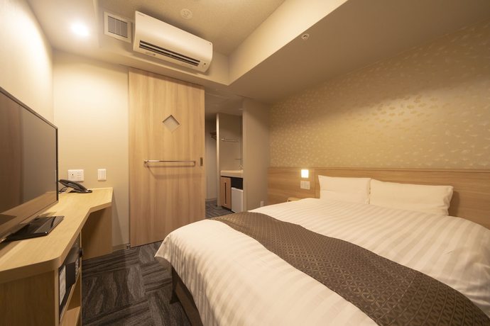 Imagen de la habitación del Hotel Dormy Inn Premium Namba Annex Natural Hot Spring. Foto 8