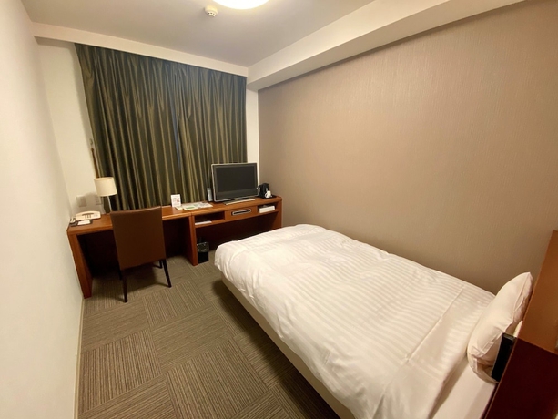 Imagen de la habitación del Hotel Dormy Inn Takamatsu Hot Spring. Foto 13