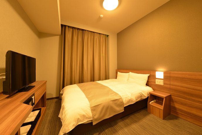 Imagen de la habitación del Hotel Dormy Inn Takamatsuchuokoenmae Natural Hot Spring. Foto 4