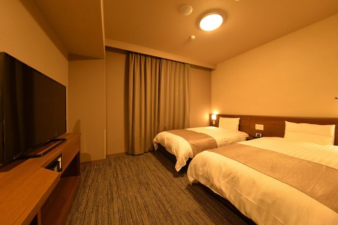 Imagen de la habitación del Hotel Dormy Inn Takamatsuchuokoenmae Natural Hot Spring. Foto 11