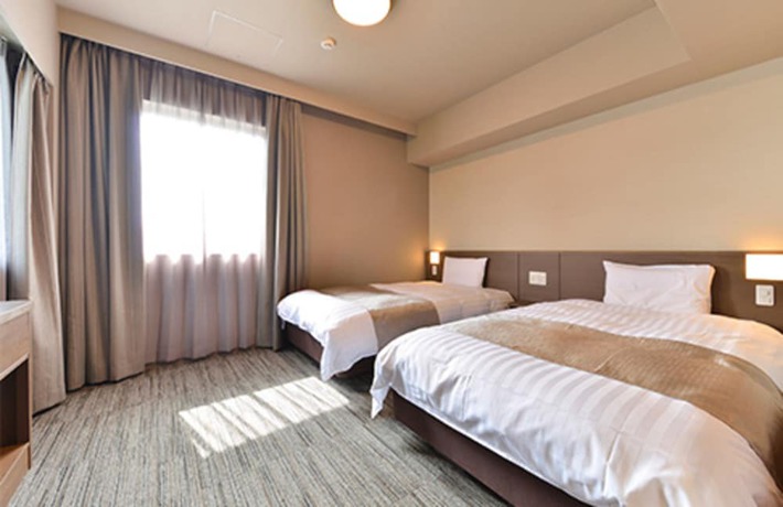 Imagen de la habitación del Hotel Dormy Inn Takamatsuchuokoenmae Natural Hot Spring. Foto 13