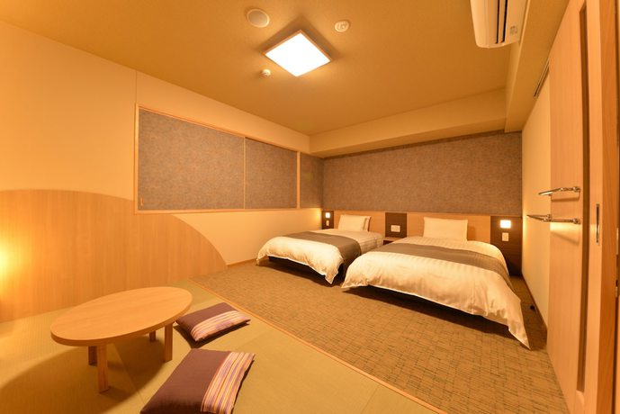Imagen de la habitación del Hotel Dormy Inn Takamatsuchuokoenmae Natural Hot Spring. Foto 15