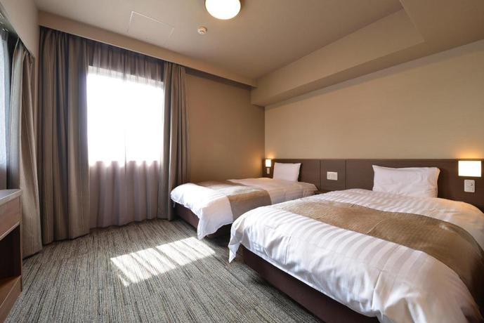 Imagen de la habitación del Hotel Dormy Inn Takamatsuchuokoenmae Natural Hot Springs. Foto 6