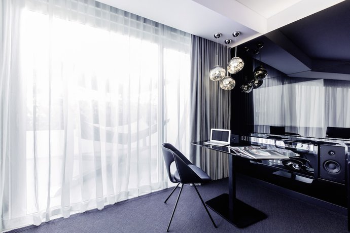 Imagen de la habitación del Hotel Dorsett Changi City Singapore. Foto 11