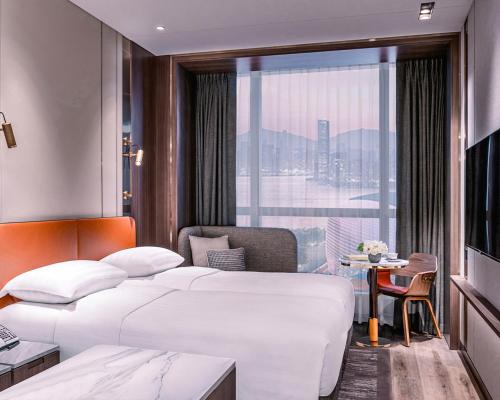 Imagen de la habitación del Hotel Dorsett Kai Tak, Kowloon. Foto 12