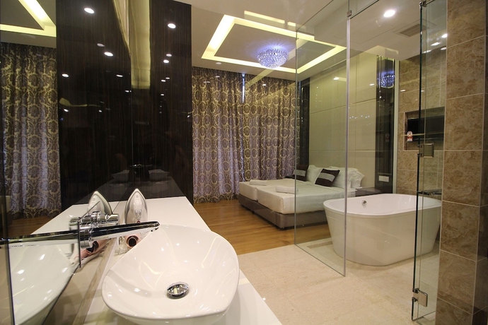 Imagen de la habitación del Hotel Dorsett Residences Bukit Bintang - Emy Room. Foto 3