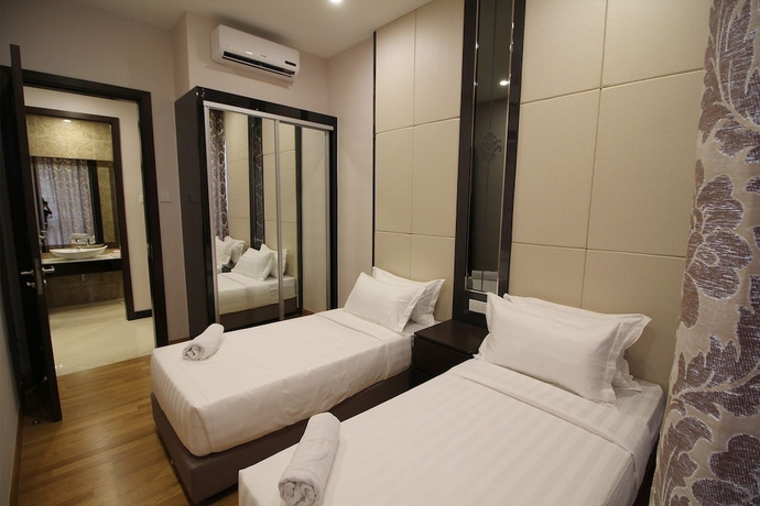 Imagen de la habitación del Hotel Dorsett Residences Bukit Bintang - Emy Room. Foto 4