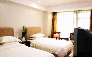 Imagen de la habitación del Hotel Dorure International. Foto 4