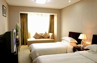Imagen de la habitación del Hotel Dorure International. Foto 5