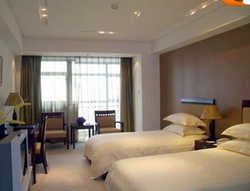 Imagen de la habitación del Hotel Dorure International. Foto 6
