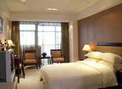 Imagen de la habitación del Hotel Dorure International. Foto 7