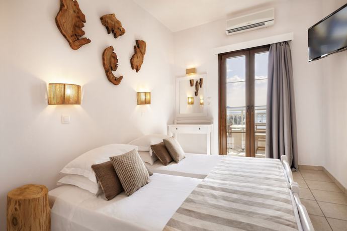 Imagen de la habitación del Hotel Doryssa Lithos. Foto 5