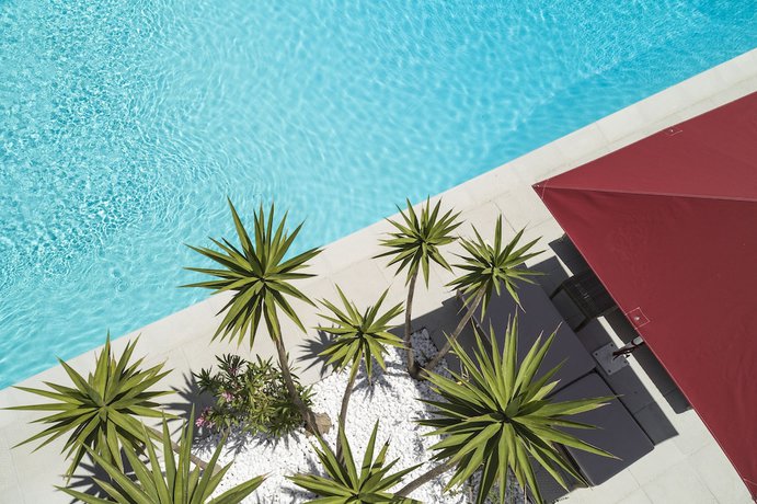 Imagen de la piscina del Hotel Doryssa Lithos. Foto 20