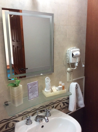 Imagen de la habitación del Hotel Dos Patios Querétaro Curamoria Collection. Foto 6