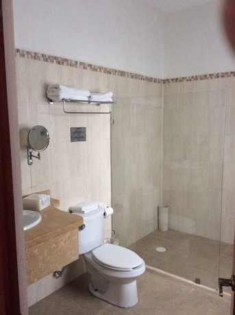 Imagen de la habitación del Hotel Dos Patios Querétaro Curamoria Collection. Foto 7