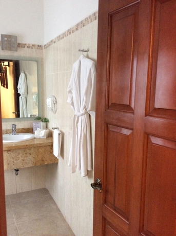 Imagen de la habitación del Hotel Dos Patios Querétaro Curamoria Collection. Foto 14