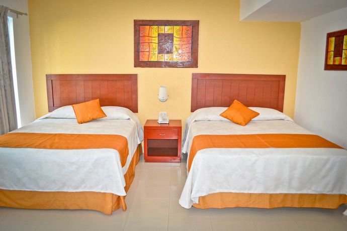 Imagen de la habitación del Hotel Dos Playas Faranda Cancún. Foto 14