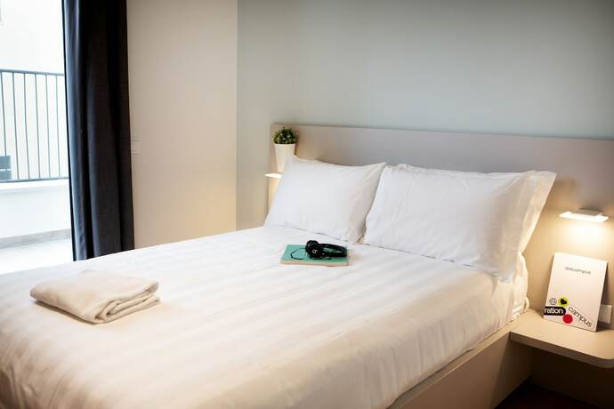 Imagen de la habitación del Hotel Dotcampus Roma City Center. Foto 18