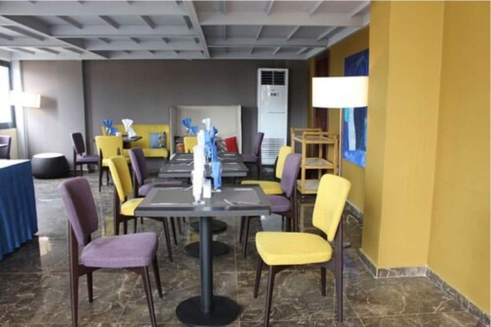 Imagen del bar/restaurante del Hotel Douala Design. Foto 11