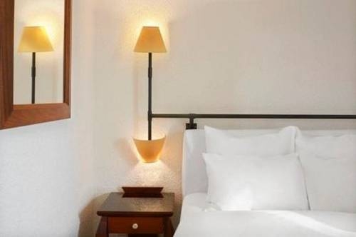 Imagen de la habitación del Hotel Douala Rabingha. Foto 7