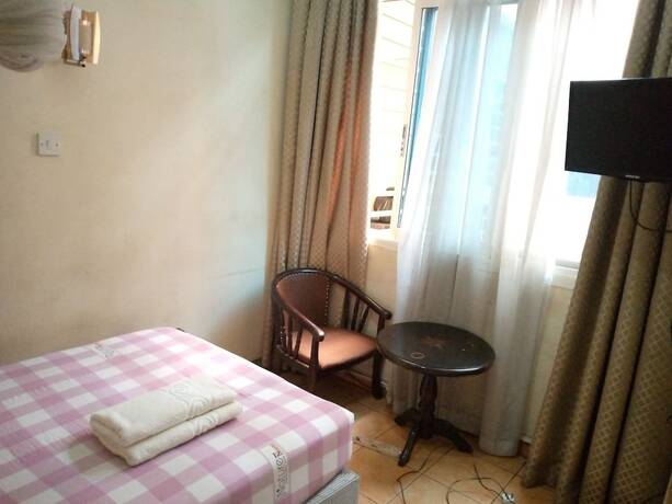 Imagen de la habitación del Hotel Double Five. Foto 12