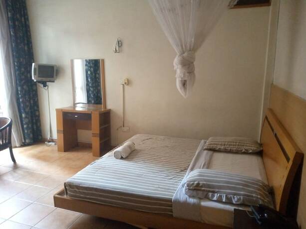 Imagen de la habitación del Hotel Double Five. Foto 13