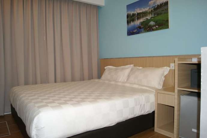 Imagen de la habitación del Hotel Double Happiness. Foto 15