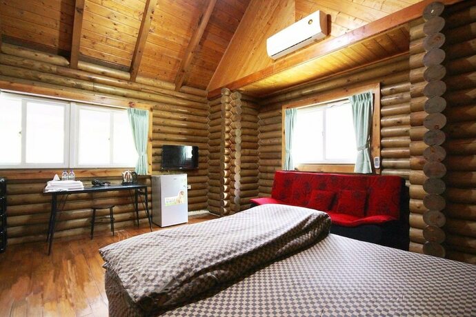 Imagen de la habitación del Hotel Double Lake Villa. Foto 16