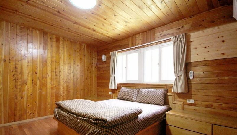 Imagen de la habitación del Hotel Double Lake Villa. Foto 18