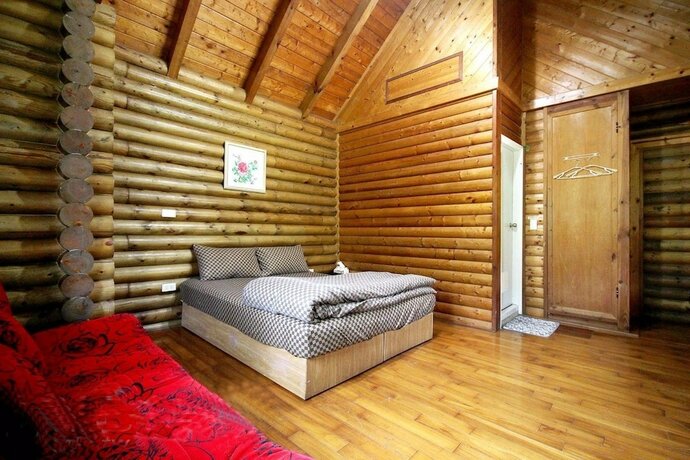 Imagen de la habitación del Hotel Double Lake Villa. Foto 19