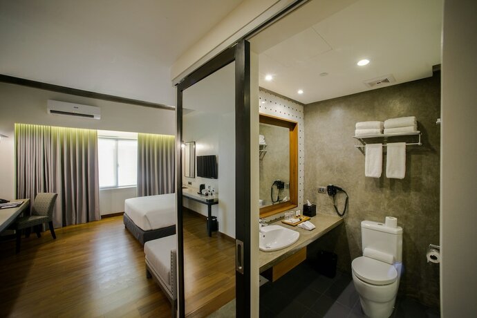 Imagen de la habitación del Hotel Double M. Foto 12