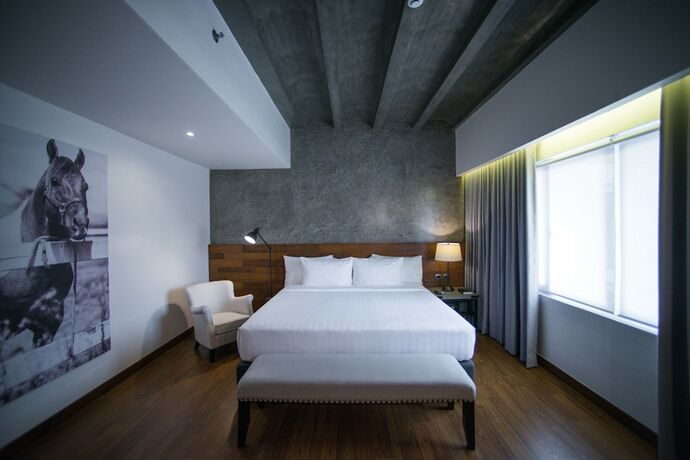 Imagen de la habitación del Hotel Double M. Foto 14