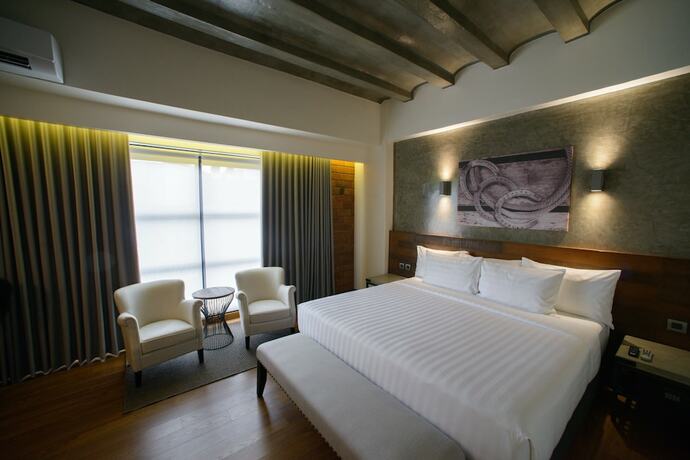 Imagen de la habitación del Hotel Double M. Foto 15