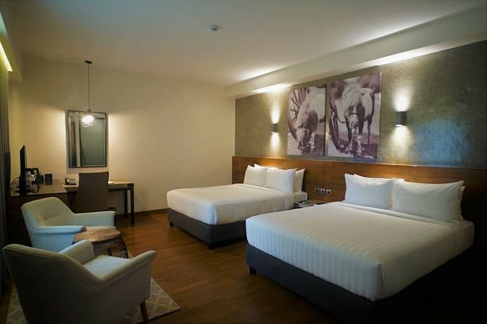 Imagen de la habitación del Hotel Double M. Foto 16