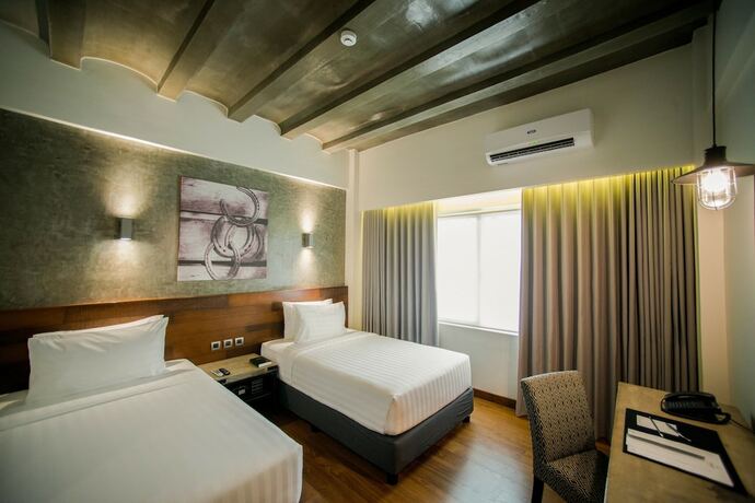 Imagen de la habitación del Hotel Double M. Foto 19