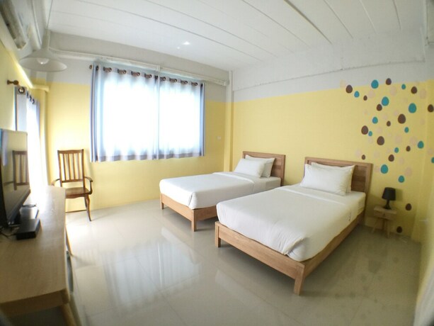 Imagen de la habitación del Hotel Double Ninth Friendly Boutique. Foto 22