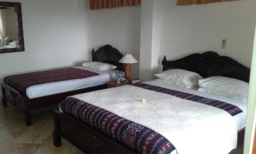 Imagen de la habitación del Hotel Double One Villas. Foto 6