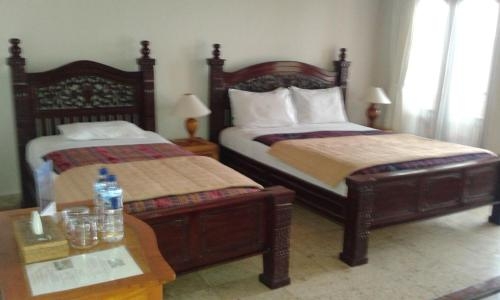 Imagen de la habitación del Hotel Double One Villas. Foto 8