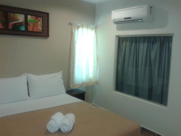 Imagen de la habitación del Hotel Double Star Klang. Foto 6