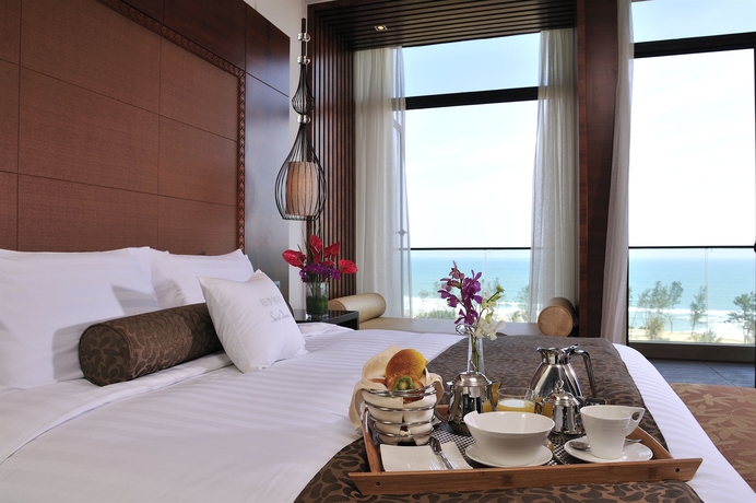Imagen de la habitación del Hotel DoubleTree Resort by Hilton Sanya Haitang Bay. Foto 7