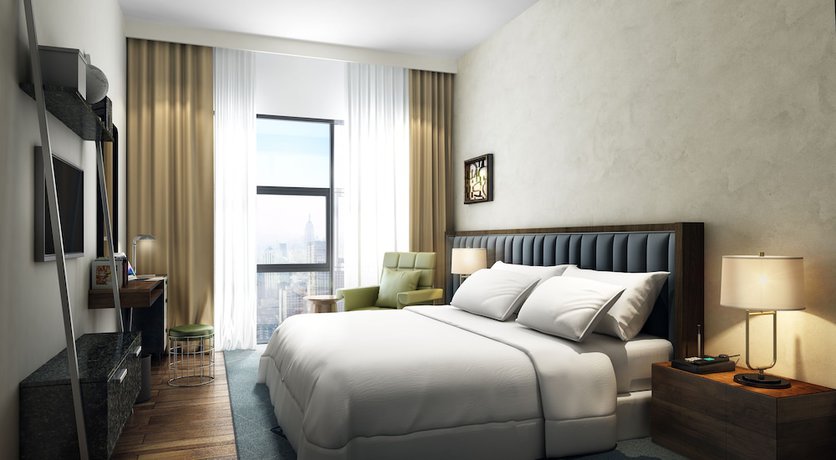 Imagen de la habitación del Hotel DoubleTree by Hilton Dubai M Square Hotel and Residences. Foto 3