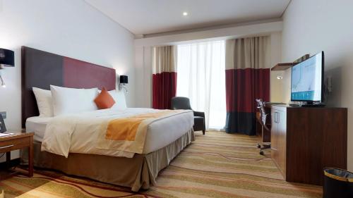 Imagen de la habitación del Hotel DoubleTree by Hilton Jeddah Al Andalus Mall. Foto 13