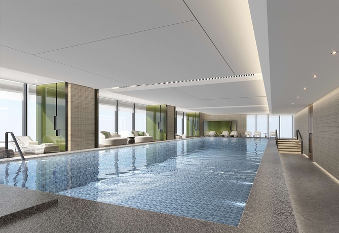 Imagen de la piscina del Hotel DoubleTree by Hilton Kunming Airport. Foto 16