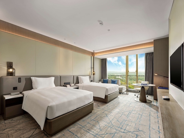 Imagen de la habitación del Hotel DoubleTree by Hilton Qidong, China. Foto 10