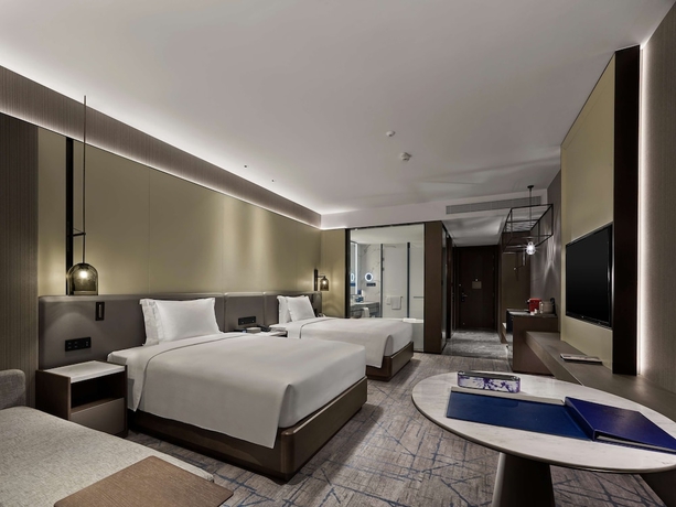 Imagen de la habitación del Hotel DoubleTree by Hilton Qidong, China. Foto 11
