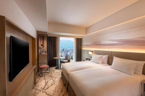 Imagen de la habitación del Hotel DoubleTree by Hilton Toyama. Foto 6