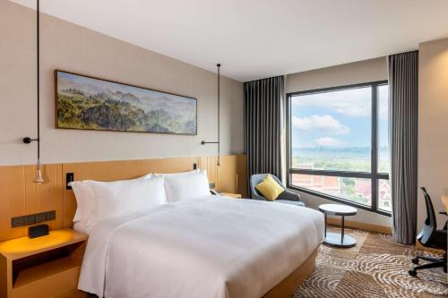 Imagen de la habitación del Hotel DoubleTree by Hilton Vientiane. Foto 7